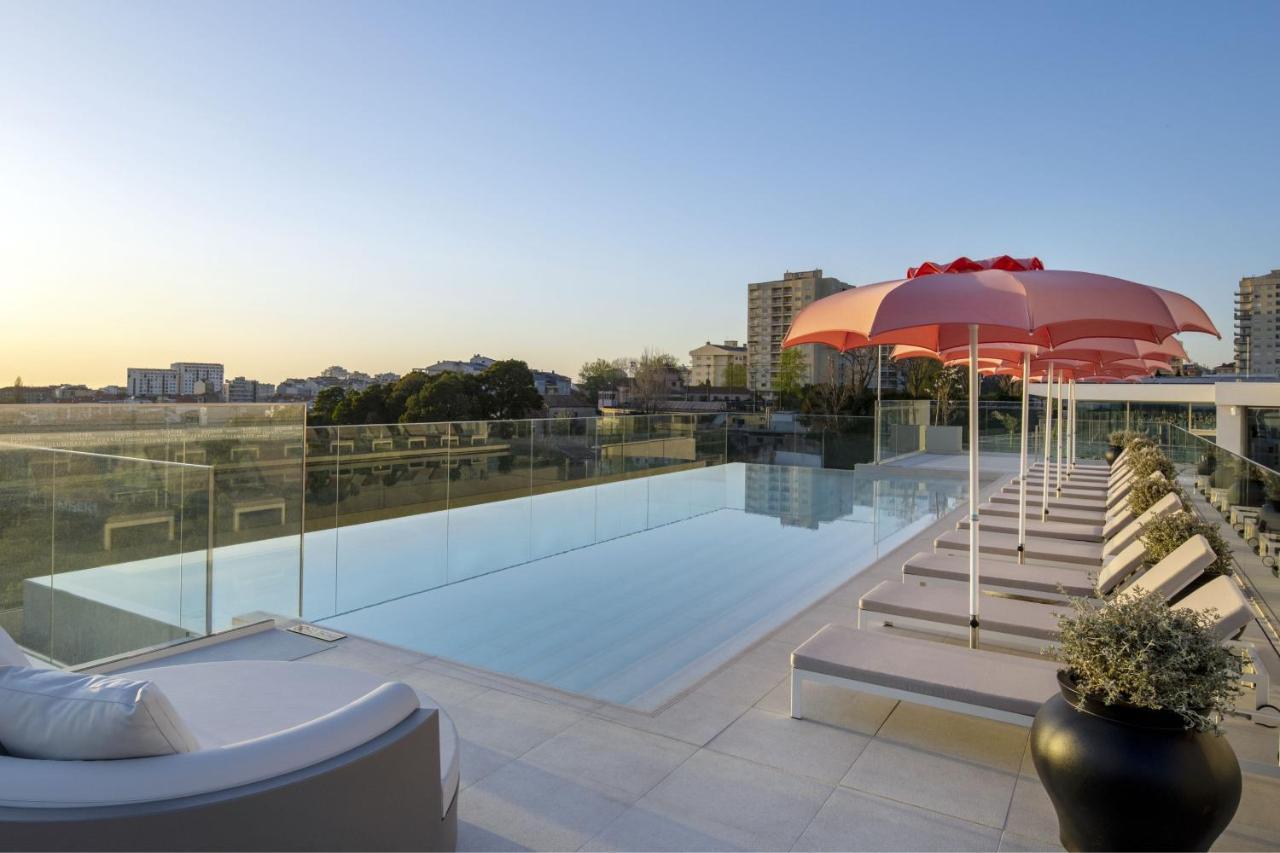 Renaissance Porto Lapa Hotel מראה חיצוני תמונה The rooftop pool at the hotel